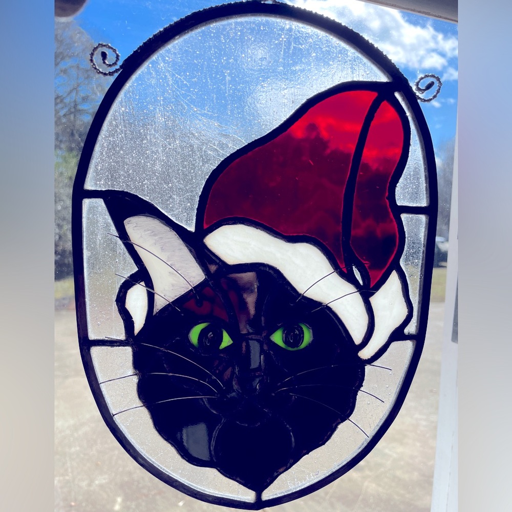 Handcrafted stained glass, inspired by my Cat!11 1/2”L x 8 1/2”W Meowy Christmas